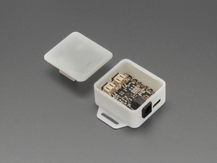 Angled shot of solar charger PCB in enclosure with lid off.