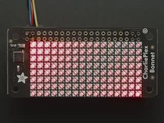 Video of a LED matrix add-on board glowing red light.