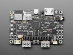 Overhead shot of black, credit-card-sized microcontroller.