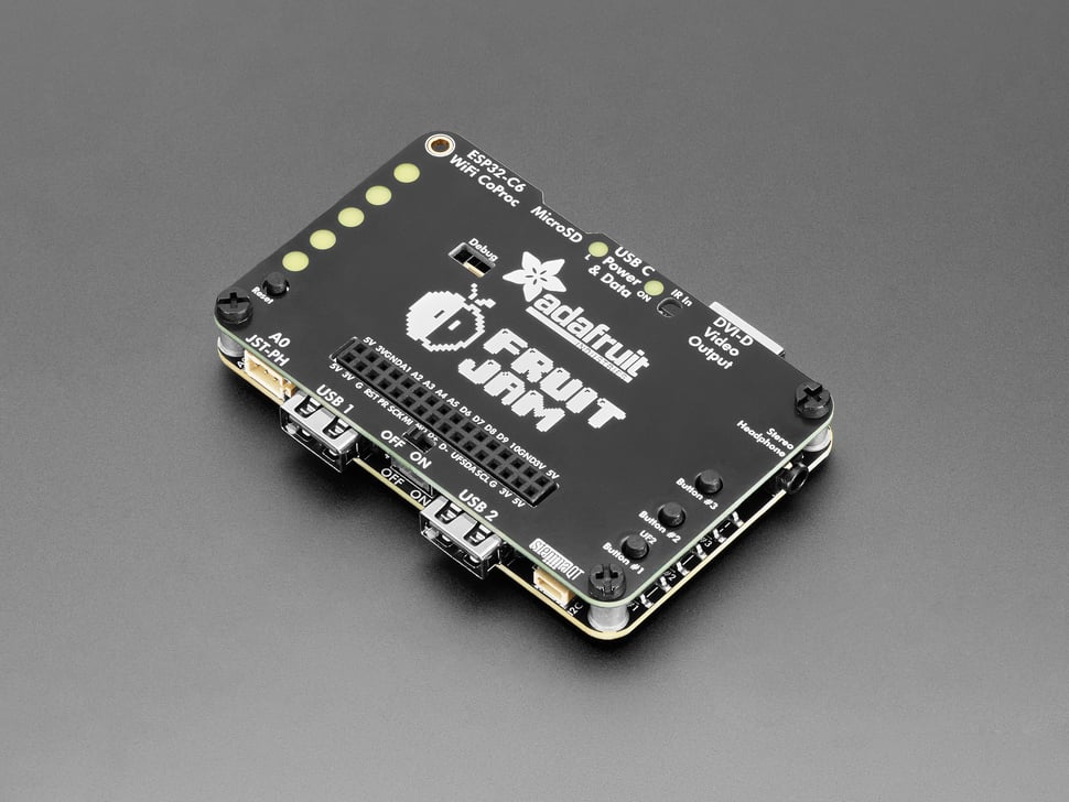 Angled shot of assembled mini computer PCB with plate.