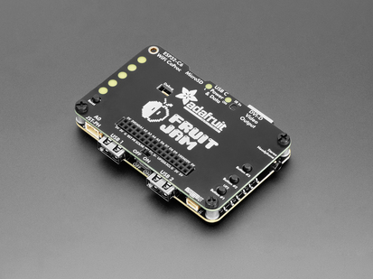 Angled shot of assembled mini computer PCB with plate.