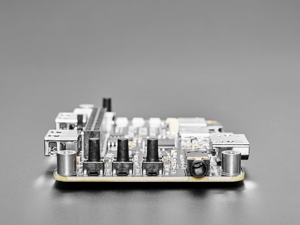Close-up of tactile switches on PCB.
