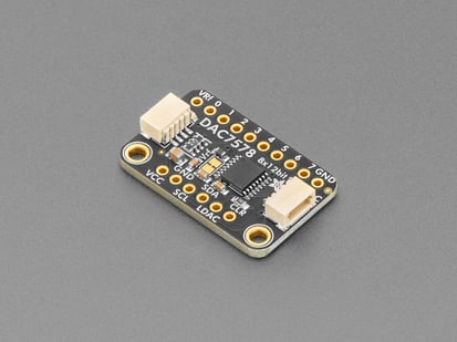 Angled shot of black, rectangular DAC breakout board.