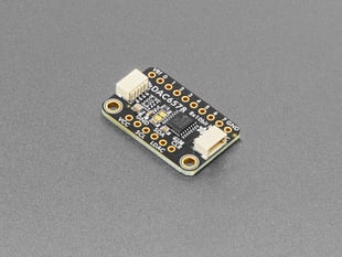 Angled shot of black, rectangular DAC breakout board.