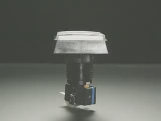 A white hand pressing an index finger on a push-button.