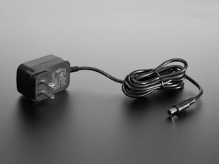 Angled Shot of the9 VDC 1000mA regulated switching power adapter/