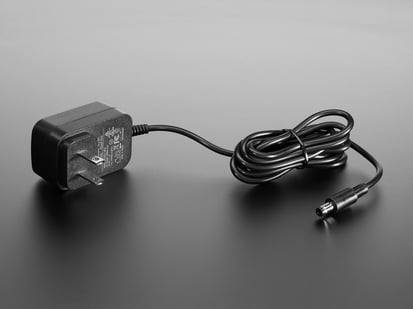 Angled Shot of the9 VDC 1000mA regulated switching power adapter/