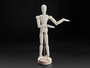 20cm tall wooden mannequin with arms gesturing.