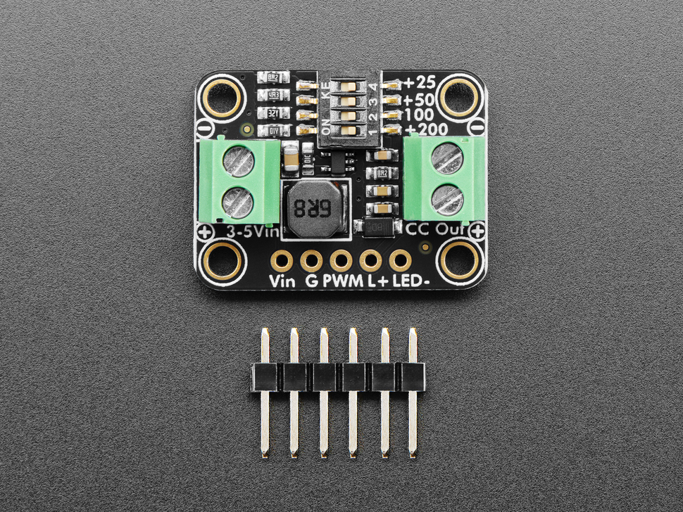 Top Down shot of black, rectangular LED driver board with 6-pin header.