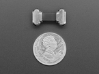 Small, slim, right angle USB C to USB C cable with U.S. quarter for scale.
