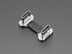Angled shot of a small, slim, 23mm long right angle USB C to USB C cable.