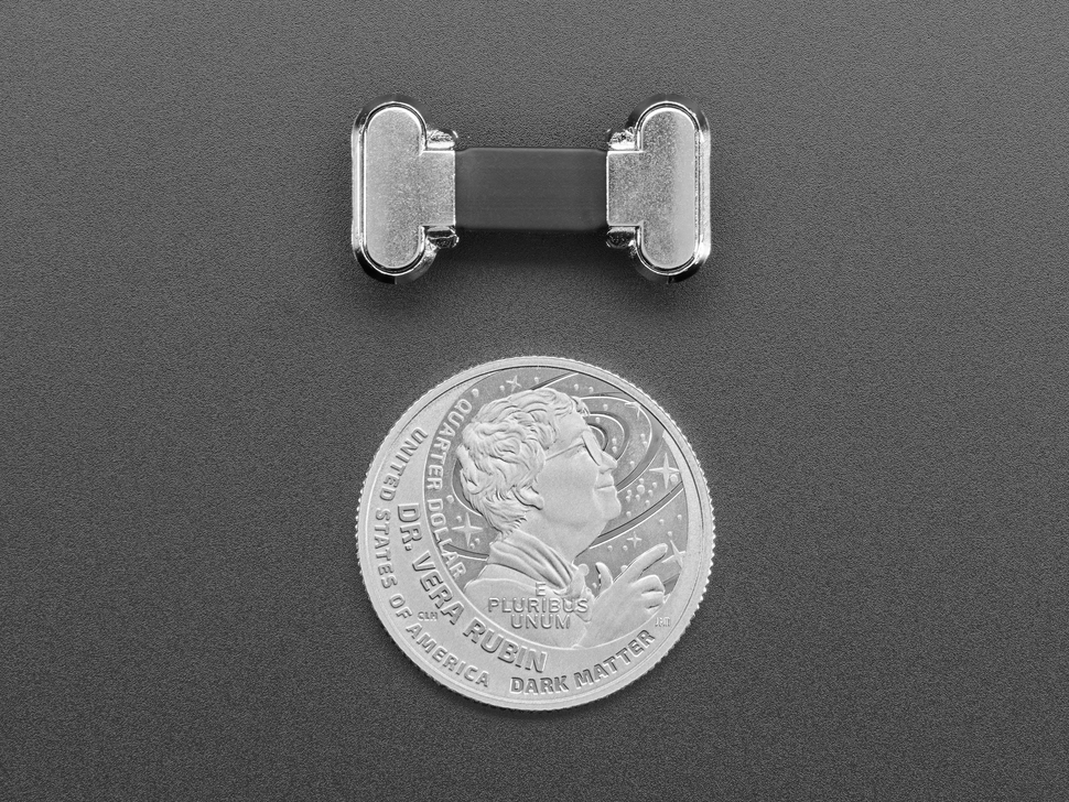 Small, slim, right angle USB C to USB C cable with U.S. quarter for scale.