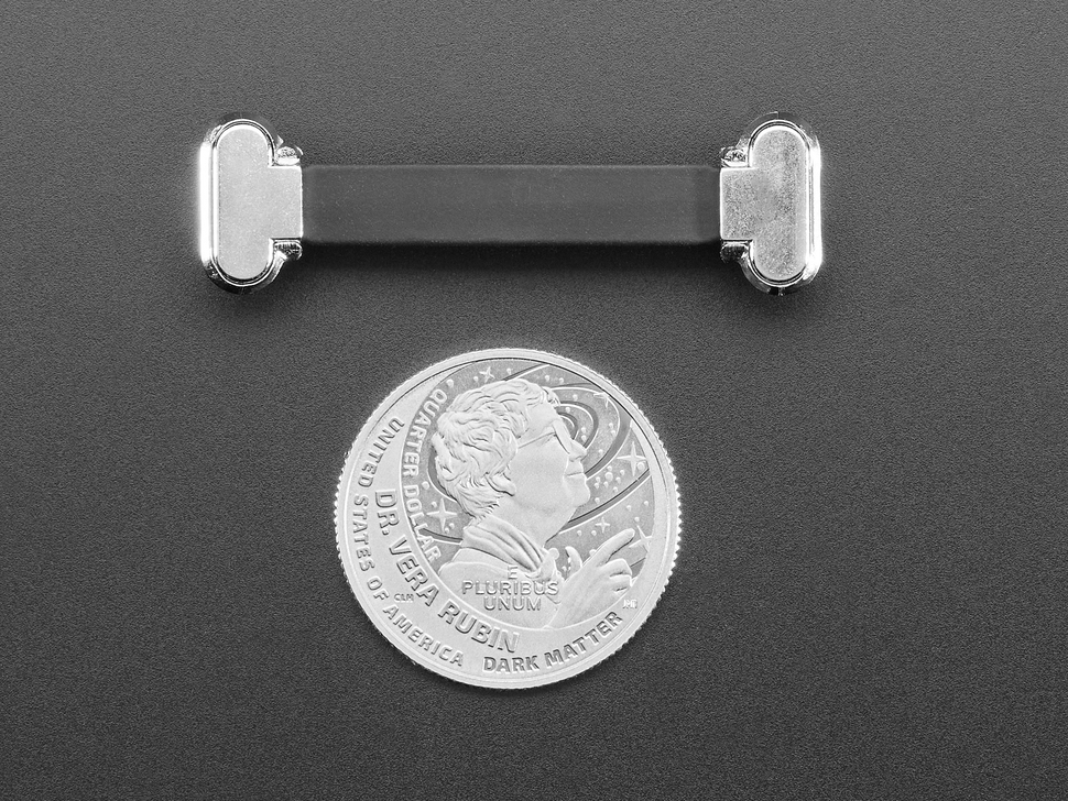 Small, slim, right angle 40mm long USB C to USB C cable with U.S. quarter for scale.