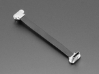 Angled shot of a small, slim, 75mm long right angle USB C to USB C cable.