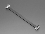 Angled shot of a small, slim, 100mm long right angle USB C to USB C cable.