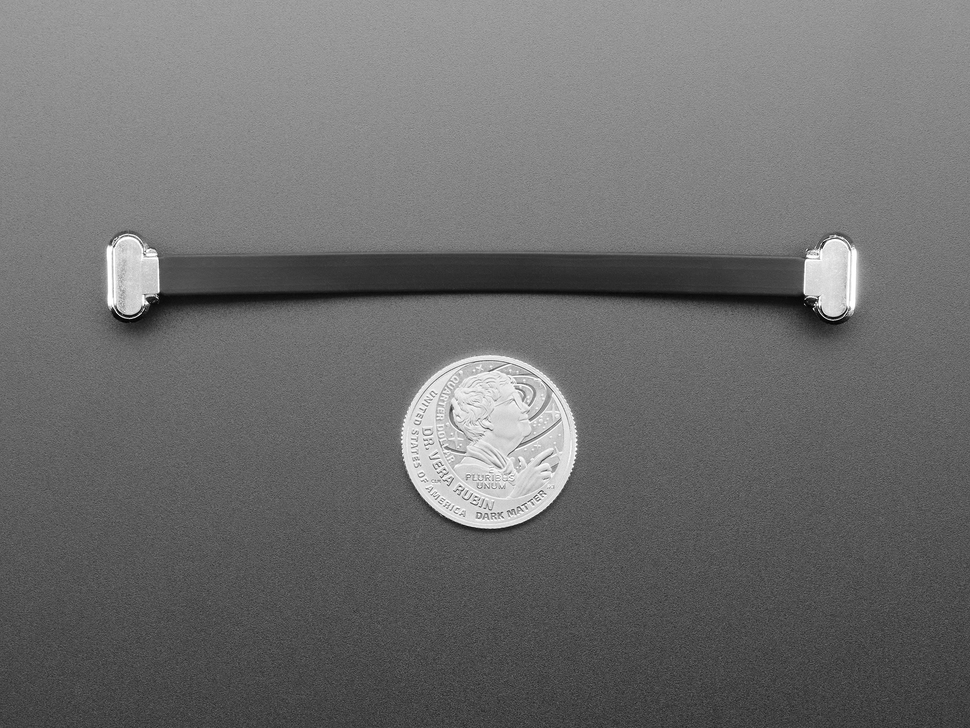 100mm long slim, right angle USB C to USB C cable with U.S. quarter for scale.