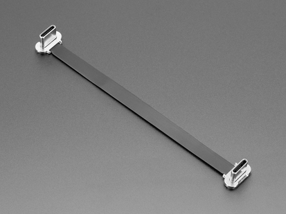 Angled shot of a small, slim, 100mm long right angle USB C to USB C cable.