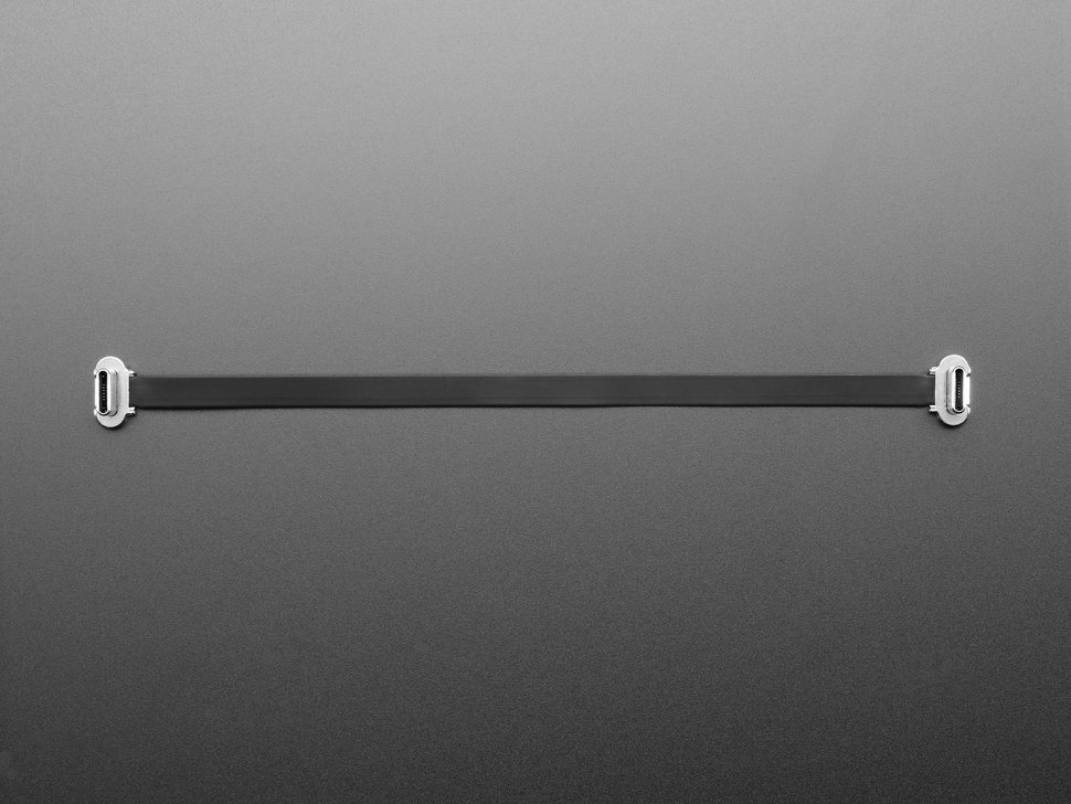 Overhead shot of a slim, 150mm long right angle USB C to USB C cable.