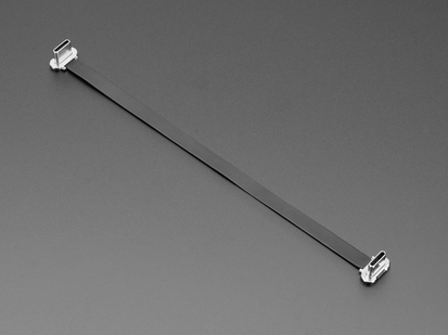 Angled shot of a slim, 150mm long right angle USB C to USB C cable.