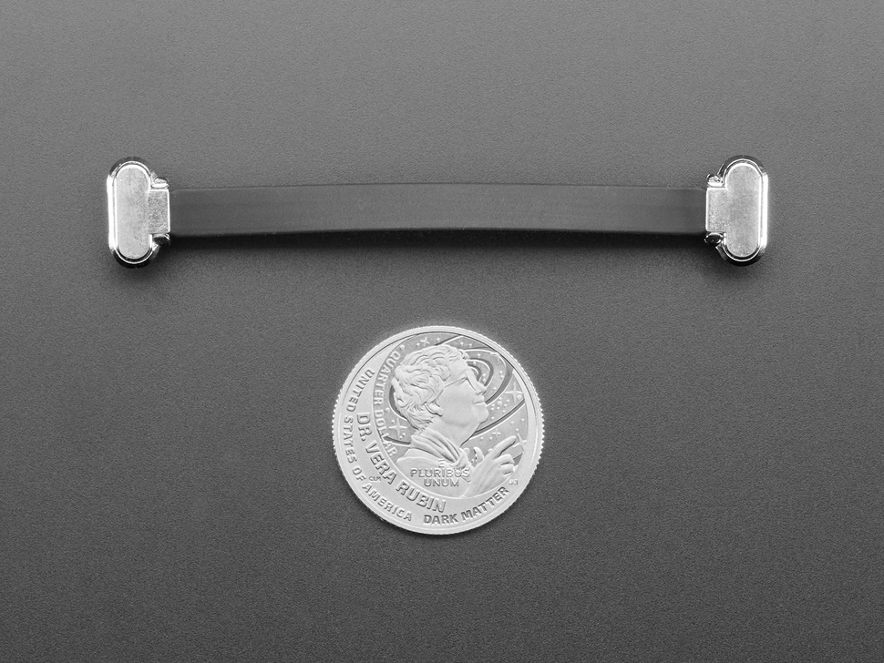 75mm long slim, right angle USB C to USB C cable with U.S. quarter for scale.