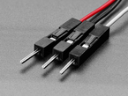 Close-up of three JST-SH plug headers on cable.