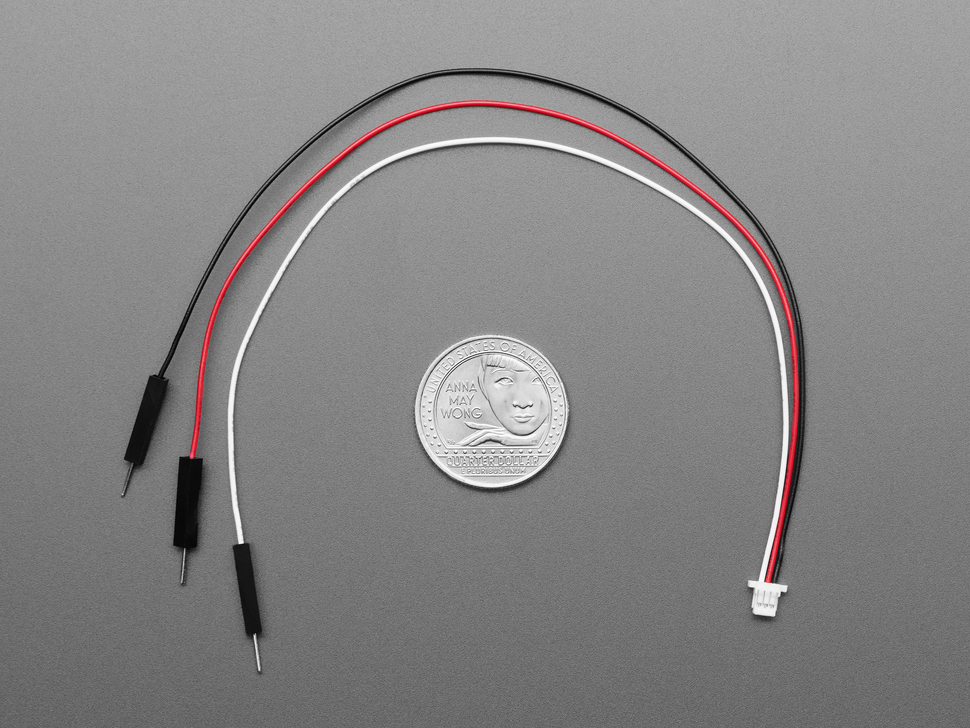 3-pin JST-SH plug header cable with red, black, and white headers with U.S. quarter for scale.