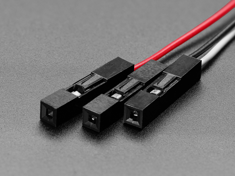 Close-up of 3-pin JST-SH socket header connectors on cable.