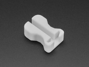 Angled shot of white plastic JST puller.