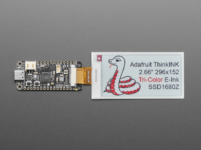 2.66" tri-color electronic ink display showing a friendly python and text: "Adafruit ThinkINK 2.66" 296x152 Tri-Color E-Ink SSD1680Z"