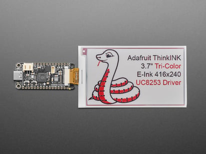 Demo Shot of the 3.7" Tri-Color Red/Black/White EPD - Bare Display with an image of a snake with text "Adafruit ThinkINK 3.7" Tri-Color E-Ink 416x240 UC8253 Driver"