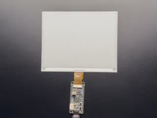 Video of a 5.85" monochrome electronic ink display transitioning into white and black blocks.