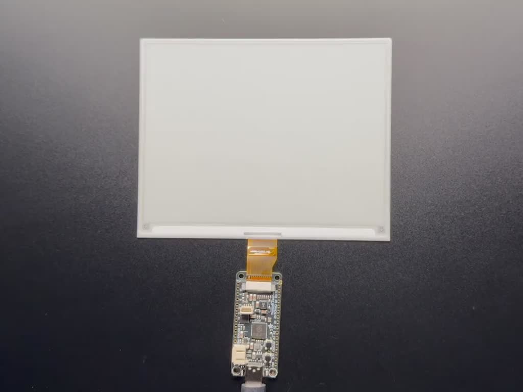 Video of a 5.85" monochrome electronic ink display transitioning into white and black blocks.