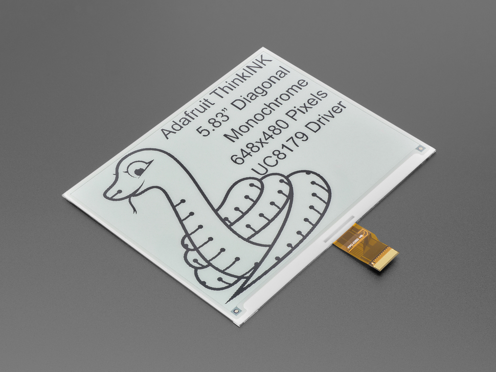 Angled shot of 5.83" monochrome electronic ink display. Graphic features a friendly python and text: "Adafruit ThinkINK 5.83" Diagonal Monochrome 648x480 Pixels UC8179 Driver."