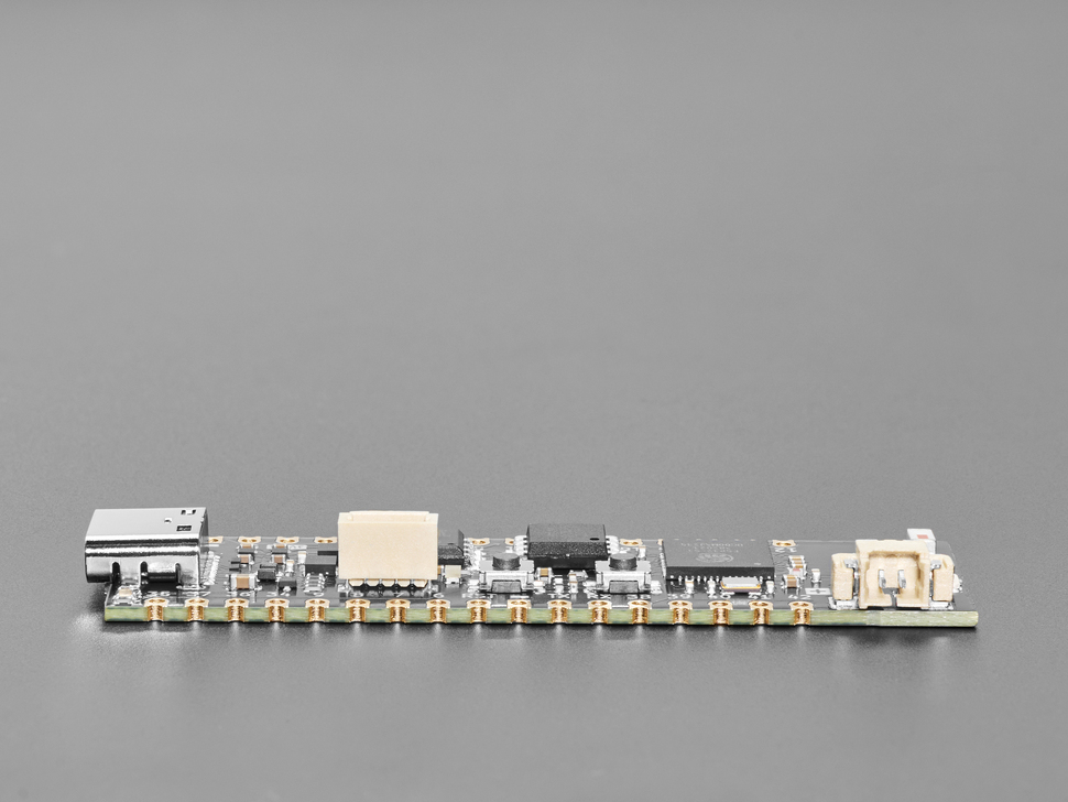 Side profile shot of black, rectangular dev board.