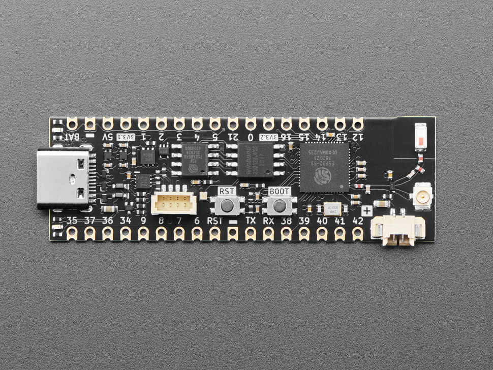 Overhead shot of long, black, skinny, dev board.