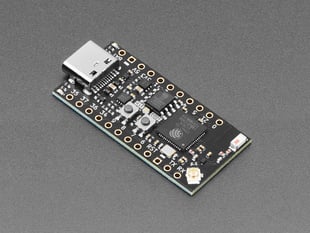 Angled shot of small, black, rectangle-shaped microcontroller.