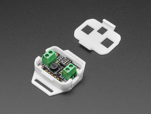 Angled shot of two acrylic enclosure pieces with a PCB.