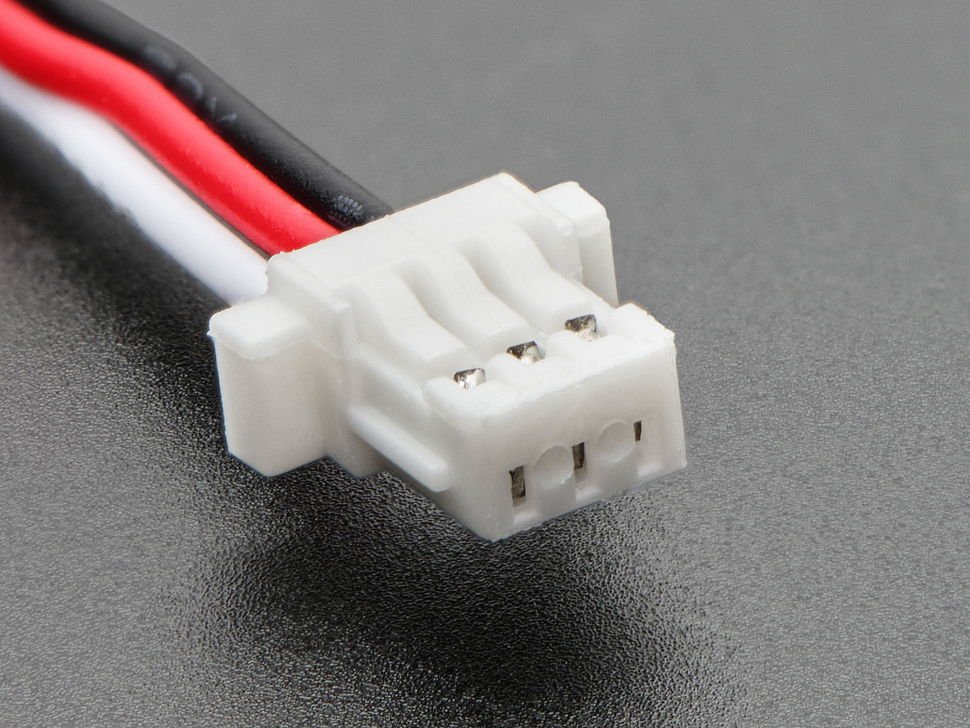 Close-up of JST-SH 3-pin plug connector.