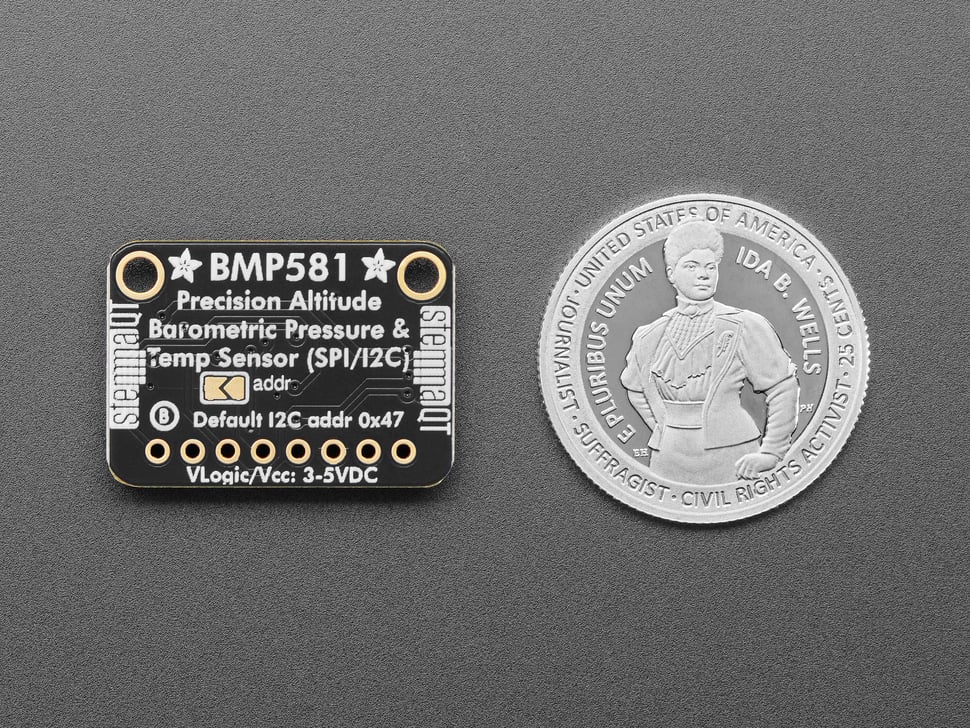 Top Down Back Shot of the Adafruit BMP581 I2C or SPI Temperature Humidity Pressure Sensor next to a U.S. Quarter for Scale.