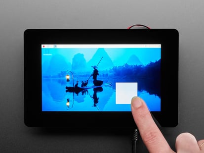 Finger creating a box on a touchscreen.