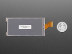 Back of 3.52" electronic ink display module with U.S. quarter for scale.