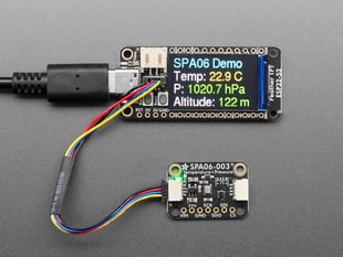 Temperature/pressure sensor breakout hooked up with a microcontroller with a TFT screen, which displays sensor information.