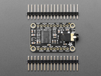 audio breakout board with 3.5mm jack and two pieces of 16-pin header.