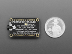 Back of audio breakout board with U.S. quarter for scale.