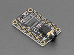 Angled shot of audio breakout board with 3.5mm jack.