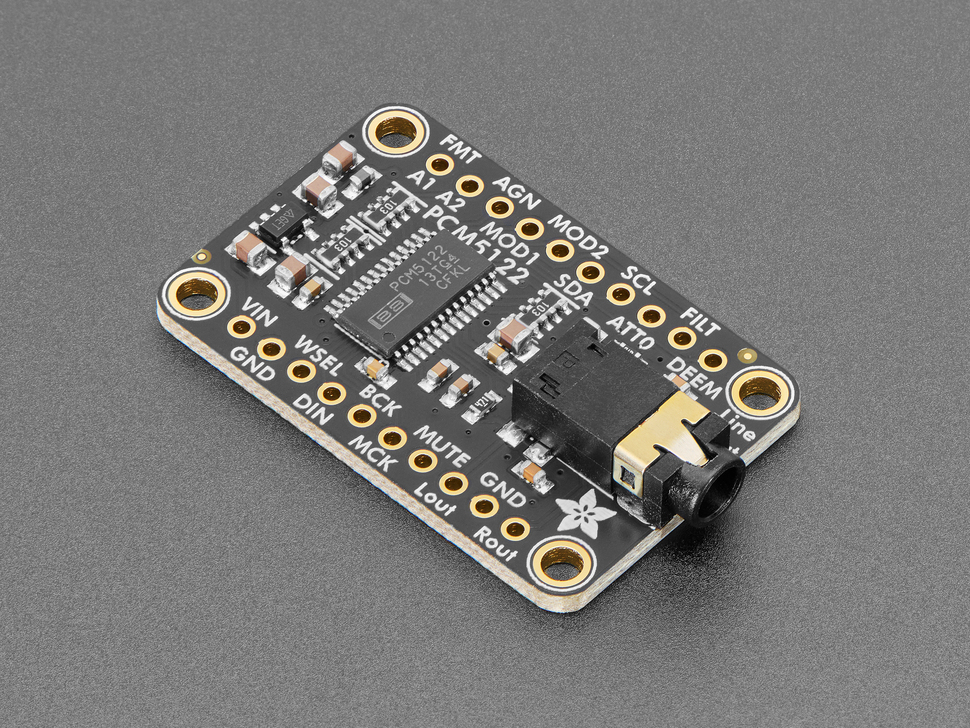 Angled shot of audio breakout board with 3.5mm jack.