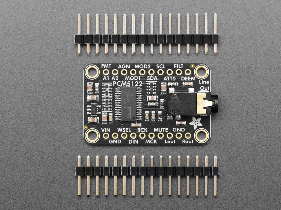 audio breakout board with 3.5mm jack and two pieces of 16-pin header.