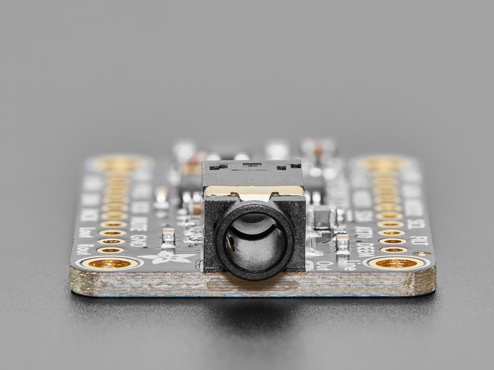 Close-up of 3.5mm audio jack on PCB.