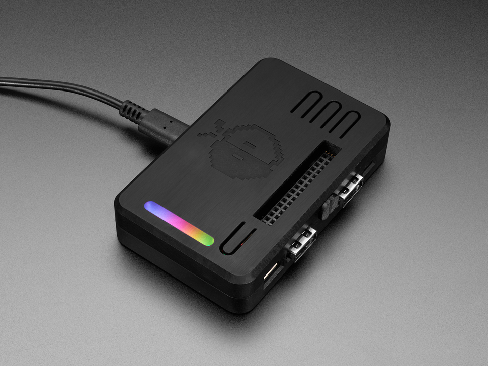 Angled Demo Shot of the Assembled Snap-on Enclosure with the Fruit Jam inside and powered on showing a rainbow effect of the LED's.
