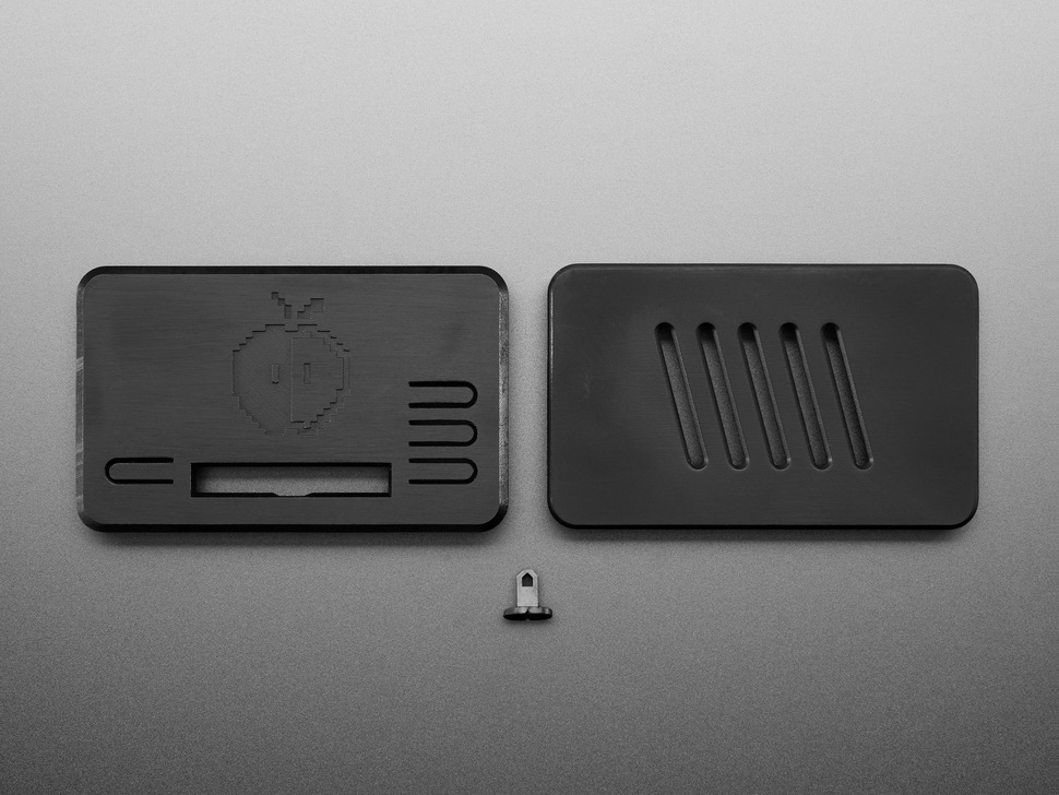 Top Down Kit Shot of the Exterior Side to the top and bottom of the Snap-on Enclosure with the Slider Attachment for the power switch.